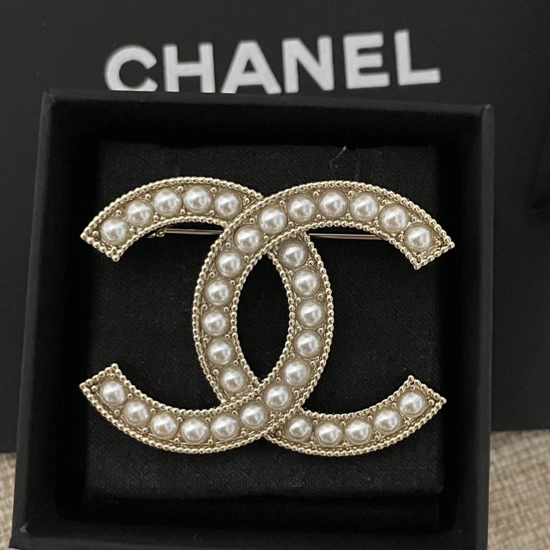 Ch*el brooches